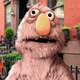 Image for article titled ‘Sesame Street’ Introduces First Enigmatic Muppet Who Has Yet To Reveal True Intentions